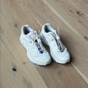Salomon White Trail Sneakers with Blue, Red and Yellow Accents
